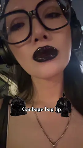 ‘Garbage bag lip’ 🖤 a glossy finish so sharp and luminous it mirrors the shine of plastic #lipcombo #liptok #CloudLabLipClays #KaleidosLipGlaze #softgoth 