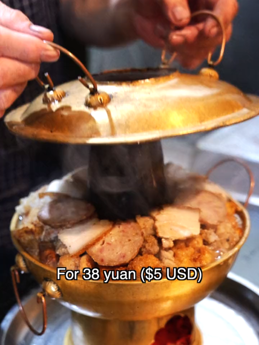 For 38 yuan I tried what looked like an authentic Chinese clay hotpot in  Yuncheng, Shanxi, filled with cabbage, meatballs, pork belly and more.  Clay pot cooking is famous for its rich flavor, but instead of a real  clay pot, I was served a premade hotpot heated with charcoal. The owner explained small clay pots are no longer made, though I would have  preferred to know that when ordering.  #food #China #travel #foodreview #ChineseFood #StreetFood #chinafood #AsianFood #Shanxi #LocalEats #AuthenticEats #FoodieShorts #Foodie #ViralEats #HiddenGems #FoodVlog #FoodShorts #TravelFood #BudgetEats #FlavorExplosion #Mouthwatering #shorts #Nanning #NightMarket #RiceRolls #CheapEats #BudgetFood #AsianStreetFood #Hotpot #ClayPot #CharcoalHotpot #RestaurantReview #ExpectationVsReality #TravelChina #AsiaFood #StreetEats #ChineseCuisine #FoodTok #Trending #Viral