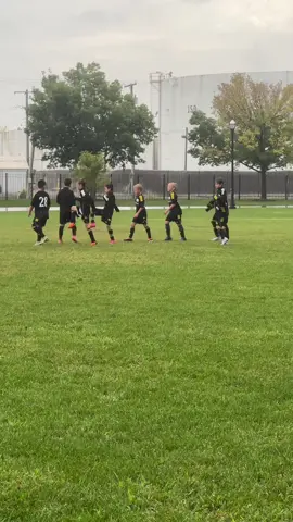 Rain or shine we play through it all. The boys doing their warmups pre game. #youthsoccer #youthsports #soccer #nils #u10 