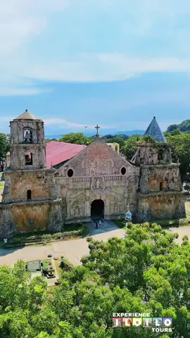 ✨Welcome to Miagao Church✨ 🚩2nd Itinerary Stop for Your Iloilo Tour!  Step into history as we bring you to the Miagao Church, also known as the Sto. Tomas de Villanueva Parish Church. Declared a UNESCO World Heritage Site in 1993, this 18th-century Baroque-style church is famous for its massive facade, intricately carved details, and its unique blend of Spanish and local Filipino architecture. 🏛️⛪ Built in 1787, the church was designed not only as a place of worship but also as a fortress to protect the town from Moro raiders. Its iconic façade features a coconut tree as the central motif, along with St. Christopher carrying the Child Jesus, symbolizing strength and faith. 🌴✨ 📍 Located in Miagao, Iloilo, this landmark is one of the province’s most treasured historical and cultural gems—making it a must-visit stop in your Iloilo tour!