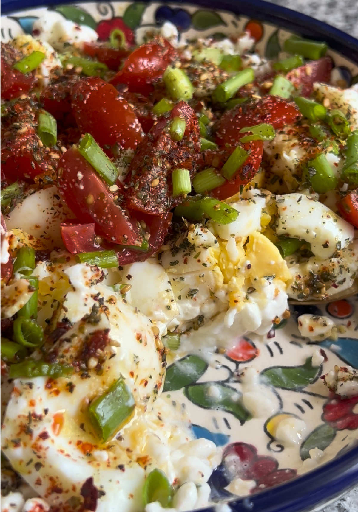 Protein-packed (30g) 5 minute meal that will keep you satisfied for hours.  I eat this at least 3x a week. I always have boiled eggs on hand to make this in no time. Add a serving of cottage cheese as the foundation with a serving of labneh. Mix that together. Top it with 2-3 chopped boiled eggs and season with salt and pepper. Then add @thenuthouseusa Palestinian za’atar for extra flavor alongside @aspiceaffair Aleppo pepper for a smoky heat. For freshness, add diced tomatoes and scallions. Cucumbers and olives work great too! Drizzle this with @mina olive oil and dig in.  It is SO goooood!! #cottagecheese#proteinrecipes#proteinbreakfast#eggsalad#fyp
