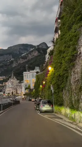 AMALFI COAST - ITALY 🇮🇹  The Amalfi Coast, located in southern Italy’s Campania region, is a breathtaking stretch of coastline along the Tyrrhenian Sea. Renowned for its dramatic cliffs, colorful villages, and crystal-clear waters, it is a UNESCO World Heritage Site celebrated for both natural beauty and cultural significance. Picturesque towns such as Positano, Amalfi, and Ravello cascade down steep hillsides, offering stunning sea views, charming narrow streets, and historic architecture. Lemon groves, terraced vineyards, and fragrant gardens add to the area’s enchanting atmosphere. Visitors come to enjoy scenic drives along the winding coastal road, explore ancient churches, savor fresh seafood and traditional dishes, and relax on beautiful beaches. The Amalfi Coast is a perfect blend of Mediterranean charm, history, and spectacular landscapes. #AmalfiCoast #ItalyTravel #MediterraneanParadise #CoastalViews #Positano          