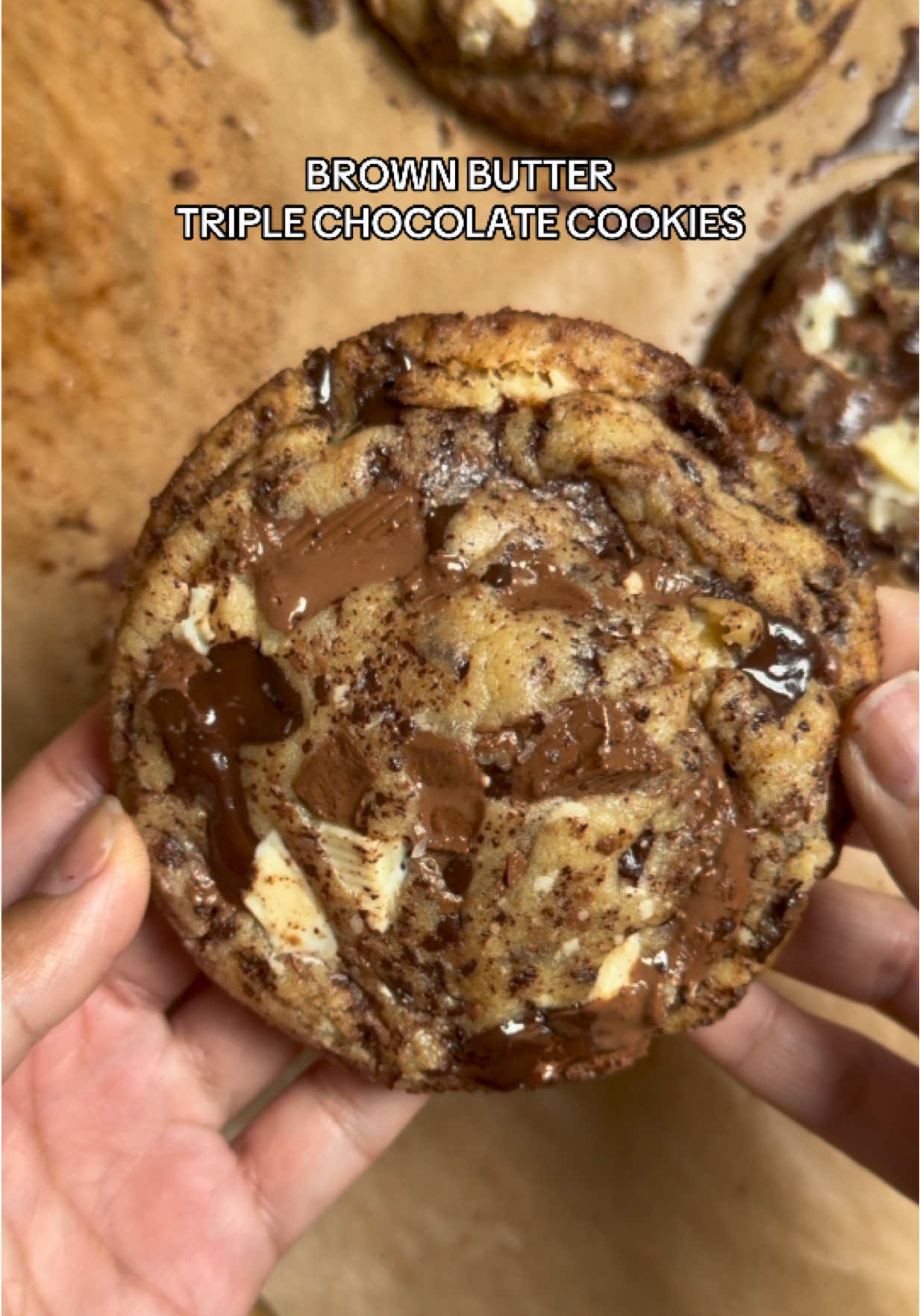 🍫🍪 BROWN BUTTER TRIPLE CHOC COOKIES 🍪🍫 I pride myself on making deliciously decadent, one ain't enough, life altering (bold claim but I stand by it), crisp round the edges, ooey gooey in the middle kinda cookies. And these?? These may be some of my best work yet 😏 Made up of a brown butter cookie dough, filled and topped with 3 kinds of chocolate and finished with a generous sprinkling of sea salt - they are sweet and salty in all the right places.  The below will make 10 chunky cookies but I urge you to double up the batch and keep a healthy stock of emergency sweet treats stashed away in the freezer. To give them a go, you will need: 250 g Unsalted Butter, diced 115 g Light Brown Sugar  110 g Caster Sugar 1 Large Egg 115 g Condensed Milk 1.5 tsp Vanilla Bean Paste 310 g Plain Flour, sifted 50 g Cornflour, sifted 1 tsp Baking Powder, sifted ½ tsp Bicarb, sifted ½ tsp Sea Salt 100 g Milk Chocolate, roughly chopped 100 g Dark Chocolate, roughly chopped 80 g White Chocolate, roughly chopped You can find the method in the comments below 👇🏽  #cookie #cookiesoftiktok #chocolatecookies #brownbutter #baking 