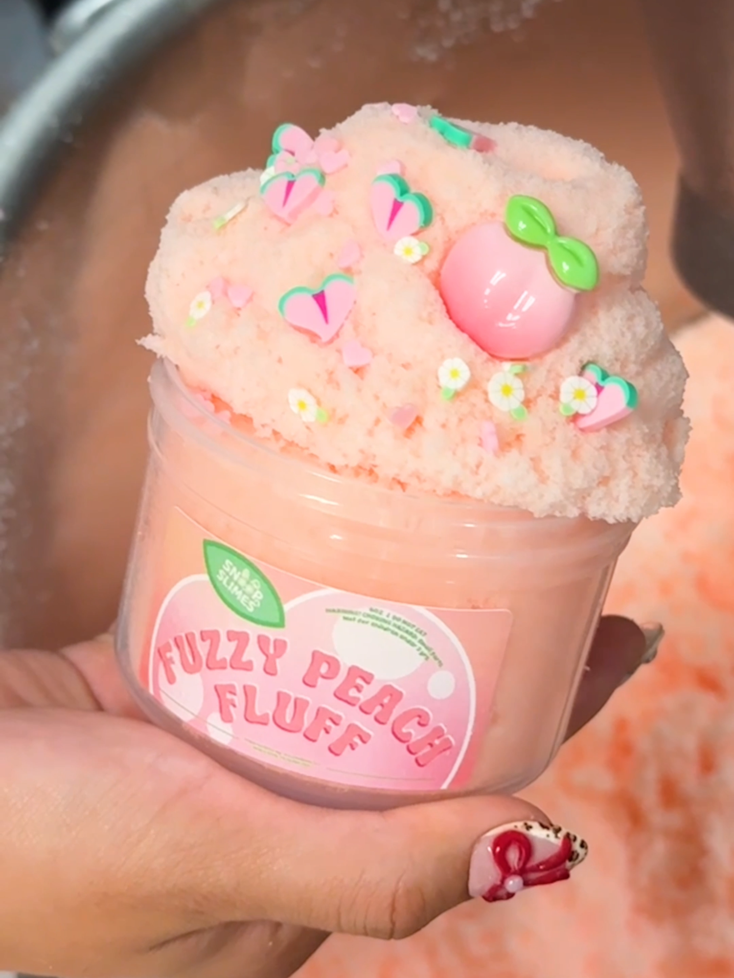 Fuzzy Peach Fluff 🍑 grab yours now on our TikTok Shop 💕 it’s like playing with a peachy cloud!☁️ what’s your favorite fruity slime?? 😋 #snoopslimes #slime #slimevideo #slimetok #slimecollection #oddlysatisfying #fyp #viral
