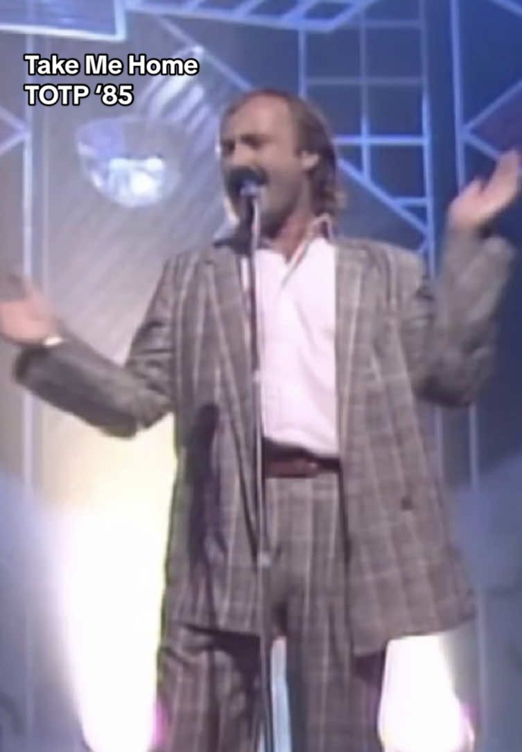 Phil Collins performing 