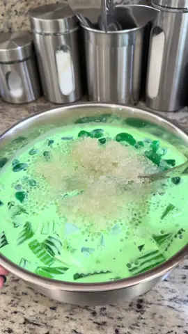 Buko Pandan dessert…  • 1 can Young coconut strips  • 1 can Carnation milk • 1 can Table cream  • 1/2 can Pandan condensed cream  • 1 can Jelly Coco (no syrup ) • 1/4 cup Sago (mini tapioca pearl)  • 1 jar/can Sugar palm seed(no syrup ) • 1 box Pandan jelly  • 1 tablespoon Pandan flavor  • 1 teaspoon Pandan flavor paste   If you can’t find pandan condensed cream, regular condensed milk will work fine. If you preferred more sweet. Just add more  jelly •Make sure to bring water to a full boiling . Then turn off the stove before adding in the jelly powder immediately and stir.  •Make sure to bring water to a full boiling before adding in the sago(mini tapioca pearl). Continue to let it simmer until translucent (20-25 minute)  #nuocmamafoods #heffaaclub #dessert #bukopandan #phillipines