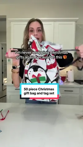 This 50 piece gift bag and tag set makes them less than a dollar apiece. You get seven different sizes with the cutest designs.@QVC, Inc #tiktokshopblackfriday #giftbags #giftwrappinghacks #christmasgifts #christmashack 
