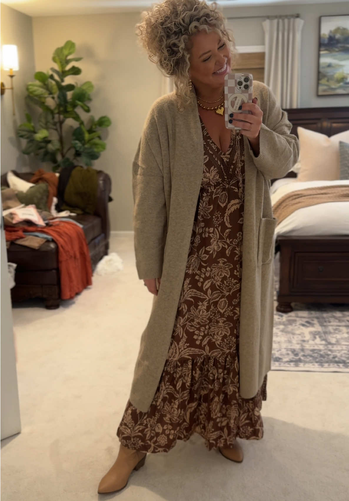 The prettiest fall maxi dress with the coziest long cardigan. Colder weather, you are welcome here now. (I’m wearing a 1XL in the dress and a XXL in the cardigan) #falldresses #longcardigan #familypictures #maxidress #cardiganoutfit 