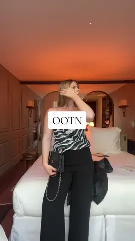 Getting all dolled up just to take yourself to dinner in a different country >>> #designervintage #OOTD #grwm #styletok #animalprint 