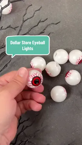 👁️A fright for sore eyes...👁️ How to: 1. Puncture the back of a plastic eyeball with the tip of your scissors (carefully, of course). 2. Vein it up with some extra red squiggles for that freshly-plucked look. 3. Slip the eye right over a fairy light and let the eerie glow shine through the night. #CreepyCrafts #HalloweenDecor #diyhalloween