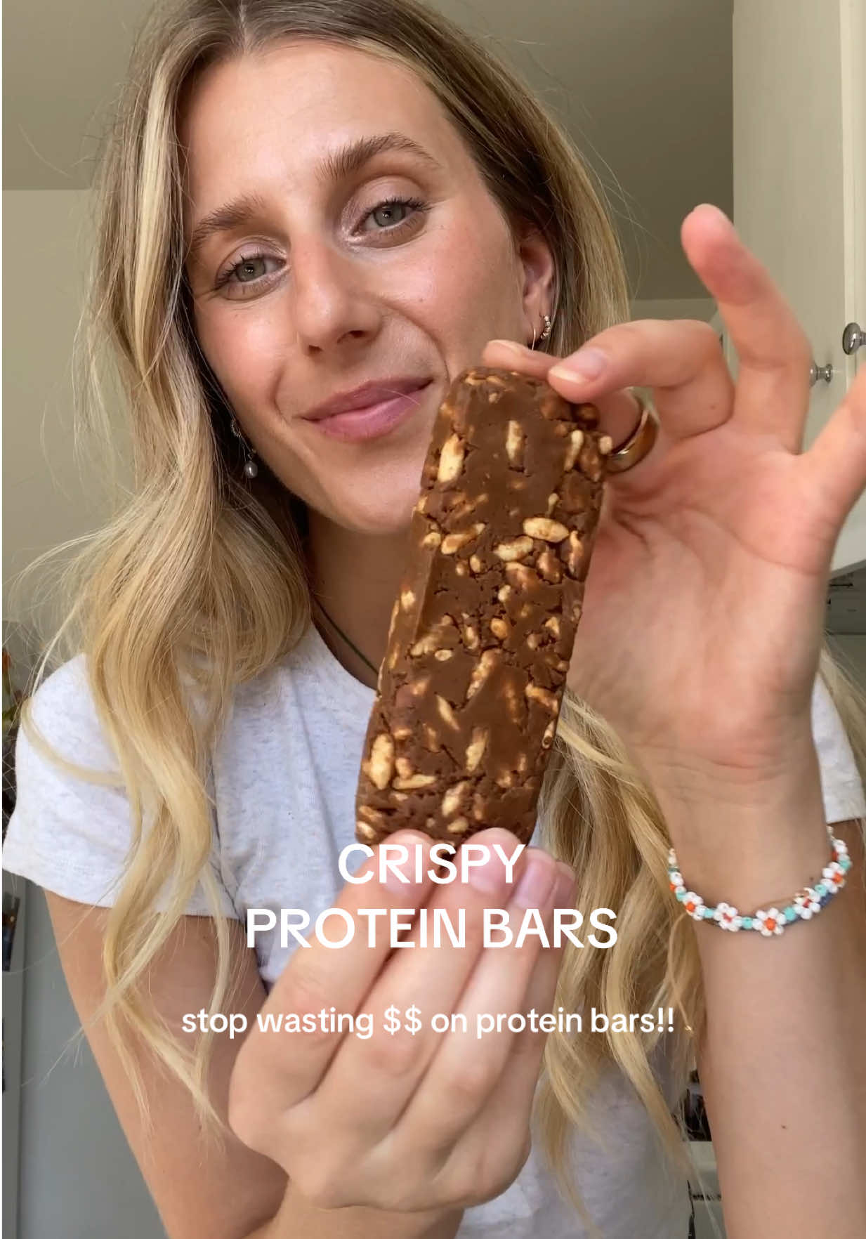 store-bought protein bars? overrated. these are way cheaper & taste better!! recipe below 👇🏼 INGREDIENTS (makes 8-10) - 3 cups puffed rice cereal or quinoa crisps - 1 cup protein powder (vanilla or chocolate) - 1 cup almond or peanut butter - ½ cup maple syrup - 1 tsp vanilla, pinch of salt HOW TO MAKE 1. Combine the puffed rice cereal and protein powder in a bowl. 2. In a small bowl, combine the almond butter, maple syrup, vanilla extract, and salt. Mix until smooth. 3. Pour the wet mixture over the dry ingredients. Stir until thoroughly coated. 4. Press into molds and chill for at least 2 hours in the refrigerator. Keeps 1 week in fridge / 1 month freezer #proteinbars 