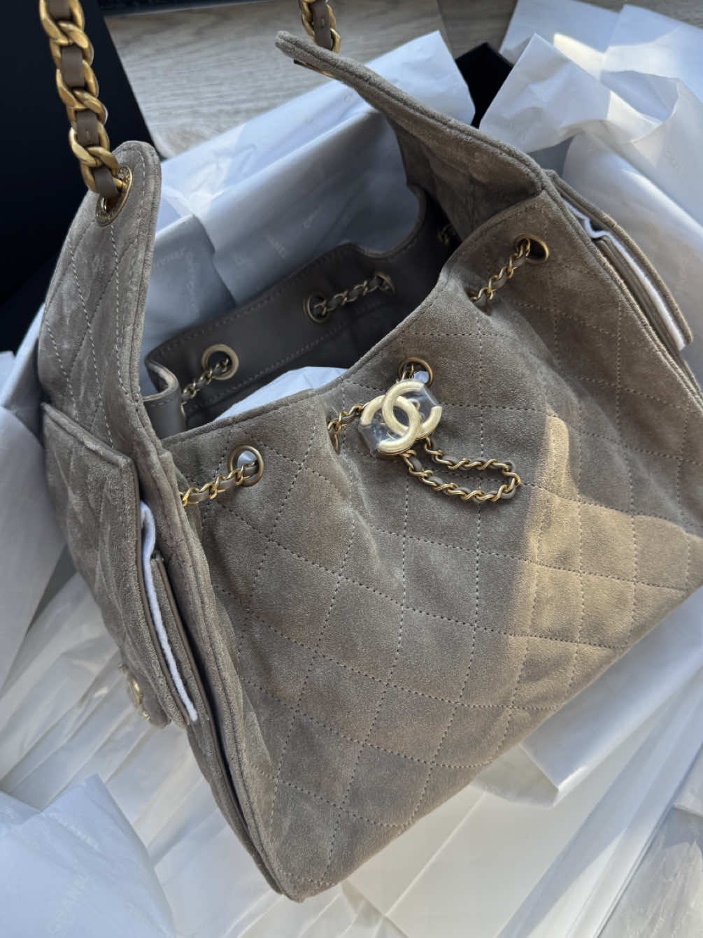 Okay, I think this has to be my ultimate favourite bag ever 😍 The Chanel 25 in grey suede — though it definitely leans more taupe, which is exactly what I was after. This one’s in the small size, and honestly, I’m obsessed. Let me know what you think… if you’re anything like me, you’ll be in love too ✨👜 #ChanelBag #Chanel25 #ChanelAddict #ChanelLover #ChanelObsessed 