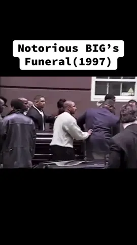 Video taken outside the memorial service for the Notorious B.I.G. that was held in Manhattan, followed by a procession held in Brooklyn in #1997 