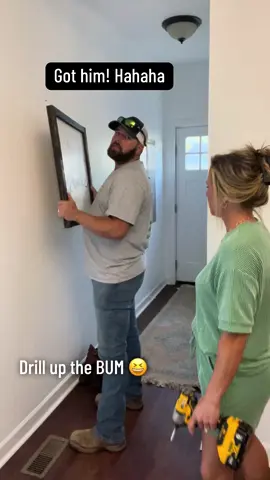 Yall 🤣😂 He probably won’t ever hang up another picture again for me! LMAO! #marriagehumor #fyp #drillinthebumprank #husbandwife 