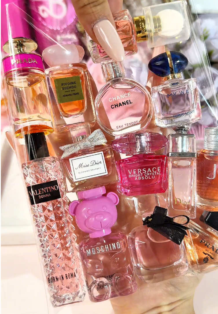 Anybody wants this pretty bag of mini perfumes?#miniperfume #parfum #perfumetiktok #asmrpackaging 