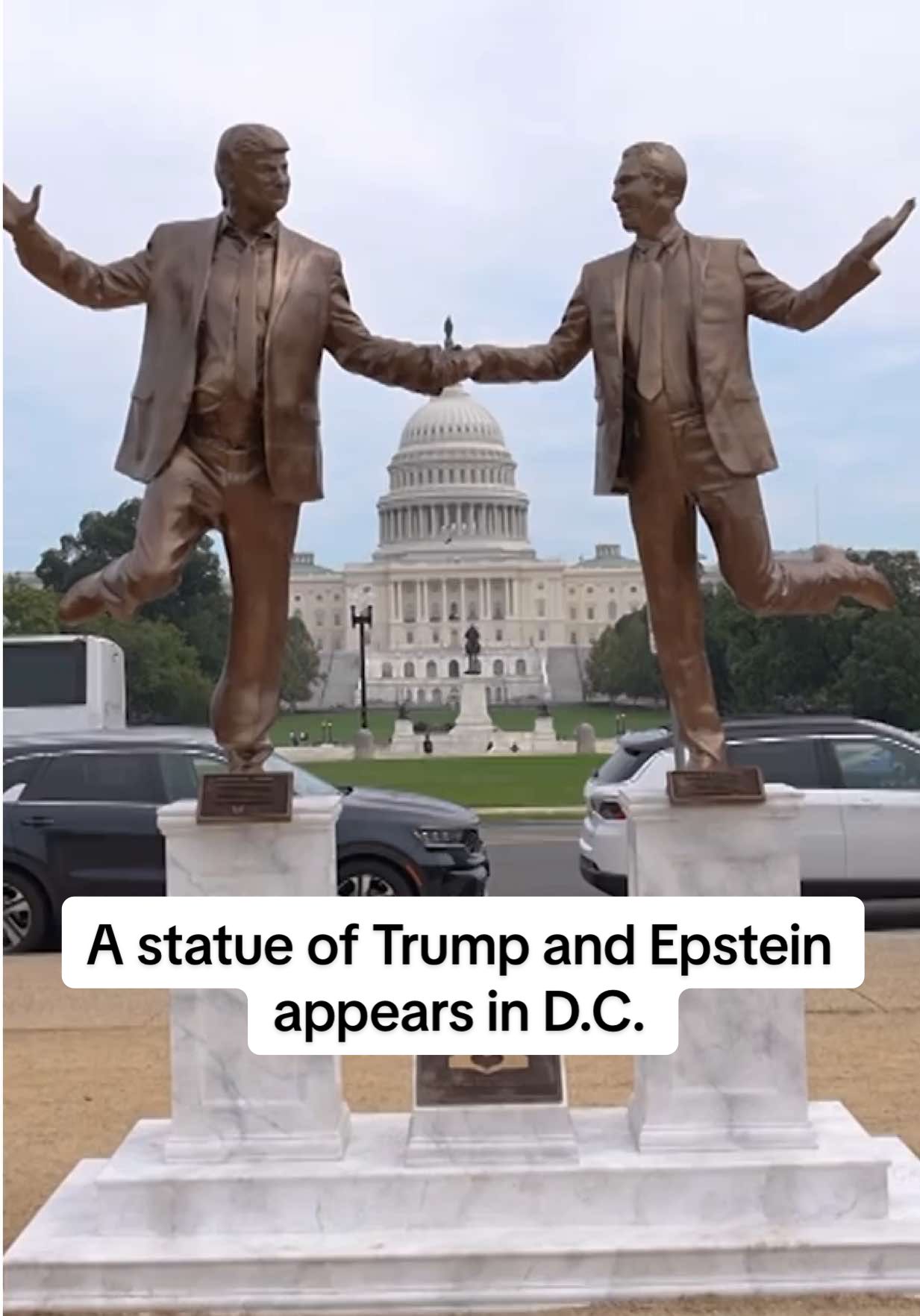 A pop-up statue of President Donald Trump and late financier and sex offender Jeffrey Epstein holding hands appears near the U.S. Capitol in Washington D.C. #trump #epstein #statue #washingtondc #nationalmall