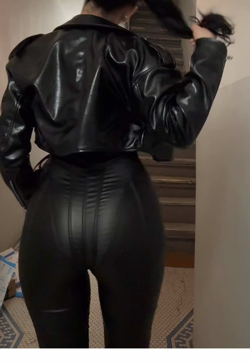 The leather catsuit is the vibe 