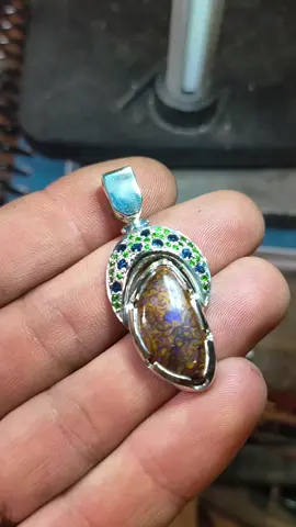 had to show off the front side of this before I get to work on the engraving, those tsavs and Sapphire matching perfectly with a beauty of a Aussie boulder opal #jewelry #JewelryMaking #fyp #fashion #ArtisanJewelry 