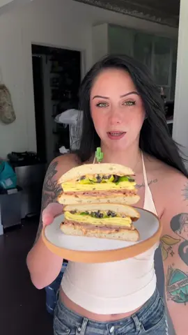 Fried Prosciutto, melted Provolone, Sun-dried Tomato Mayo, Eggs, Fresh Basil, Pepperoncini   and Black Olives!