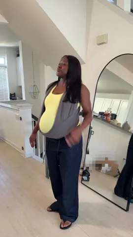 Replying to @Joy ✨💫 when your husband makes you a belly band out of a baby carrier wrap 
