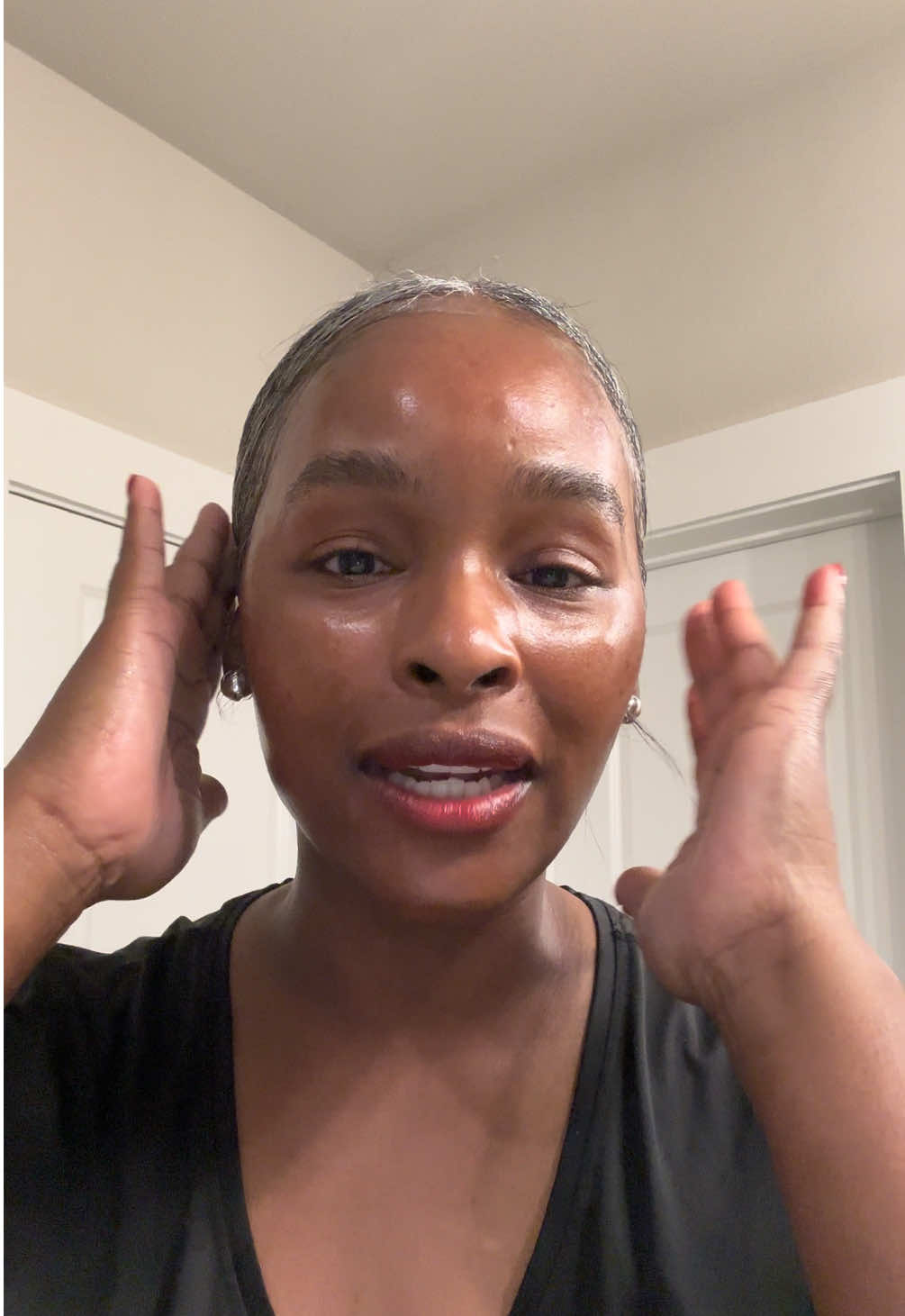 We love a sleek bun!  #dallascontentcreator #greyhair #womenover40 #greyhairjourney 