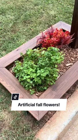My hubby built me a wonderful planter box around the mailbox to match our other bigger flower bed. These artificial fall flowers are the perfect touch since it’s by the road! #artificialflowers #falldecor #flowerbed #gardening #tiktokshoprestock 