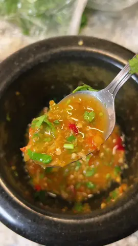 Koh Kong sauce is a Cambodian dipping sauce originating from the coastal province of Koh Kong. It’s famous for balancing salty, sour, spicy, and slightly sweet flavors — the kind of sauce that makes simple grilled meats, seafood, or soups taste bold and vibrant. The base typically includes fish sauce, lime juice, sugar, garlic, and fresh chilies. For an extra touch of freshness, you can also stir in some chopped cilantro. #fy #khmer #cambodianfood #cambodia #kohkong 