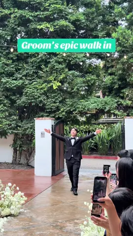 The groom’s ceremony entrance was perfectly timed with the song, making it an unforgettable wedding moment.