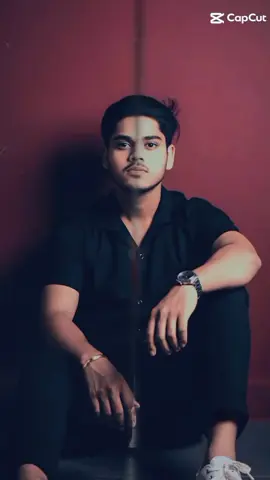 #foryoupage #myaccountunfreze #fyp #viraltiktok #jaynepal🇳🇵🇳🇵🇳🇵🇳 :8k and same face A dynamic young man with a serious expression, wearing a maroon shirt, black jeans, and suspenders, stands in a post-apocalyptic or ancient ruined city setting. He wears sunglasses and holds a golden mace over his shoulder. One foot is propped on a stone pillar. Behind him, a large, ornate statue of Lord Maa Durga is prominently featured. To his right, a majestic cheetah rests on the hood of a rusty