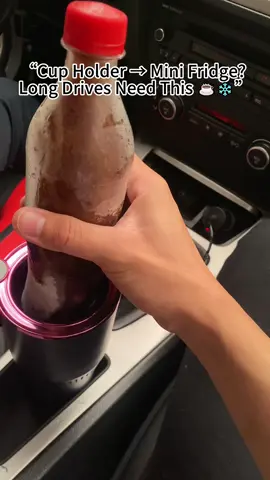 This 12V car cup cooler/warmer turns your cup holder into a mini fridge in SECONDS —plugs into your outlet, cools to 0°C or heats te 60°C! Perfect for road trips, truckers, camping, office-your new drink essential! #TikTokMadeMeBuylt #AmazonFidds #CarGadgets #CoolGadgets #travelessentials #TruckersLife #CampingEssentials #GiftIdeas