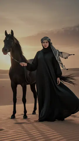 Edit Foto Gemini AI 🍒 Promt :     edit gambar menjadi sebuah foto bernuansa arabian dengan latar belakang gurun pasir dengan sedikit pancaran sinar matahari sore, pose berdiri memegang tali kuda hitam disampingnya. dengan menggunakan baju abaya serba hitam, dengan ikat kepala hitam yang terkena hembusan angin lembut, ekspresi wajah serius dan misterius dan elegan. foto terlihat realistis, jangan mengubah wajah. #aigemini #elwafaacollection #fyppppppppppppppppppppppp #CapCut @El-wafaa Collection 