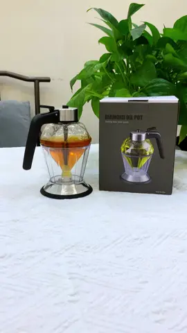 love this glass honevdispenser. it's been so much neater than using the plastic bottles or even dipping from the jar.My family has an issue with dripping honey everywhere when they use it and so far so good with this. No sticky mess outside ofthe dispenser or on the counter. It doesn't allow a huge amount to pour out at one time. #newvearnewaura #TikTokShopLastChance #spotlightfinds #honey #honeydispenser #honeystorage