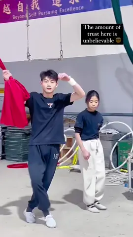 Rate the performance from 1️⃣ to 🔟 This pair mesmerizes viewers with their aerial silk routine, effortlessly twirling mid-air as they hang from fabric, merging raw power with graceful artistry. Artists: dys7gi96w291 on Douyin #art #dance #performance