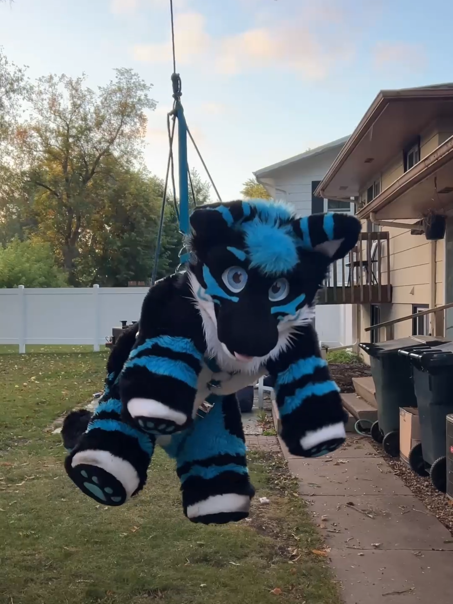 Plushie goes for a swing! #furry #fursuit #quadsuit #plushie #rockclimbing
