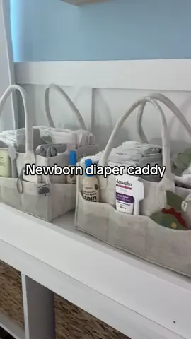 Newborn diaper caddys 🍼🩵 Filmed this video last year when prepping for Everett & I still use them every single day!! Going to keep one for him, and prep the other for baby girl 💗  Here’s what I like to keep in the caddy:  -Diapers & wipes  -Portable changing mat  -Burp cloths  -Extra onesies  -Pacis  -Diaper rash cream & spatula -Nose sucker  -Thermometer  -Gas tubes  -Hand sanitizer  -Clorox wipes  -Stain remover  -Small toys -Hair brush for baby  -Cloth bibs  #diapercaddy #newbornessentials #newborn #babyessentials #organization  