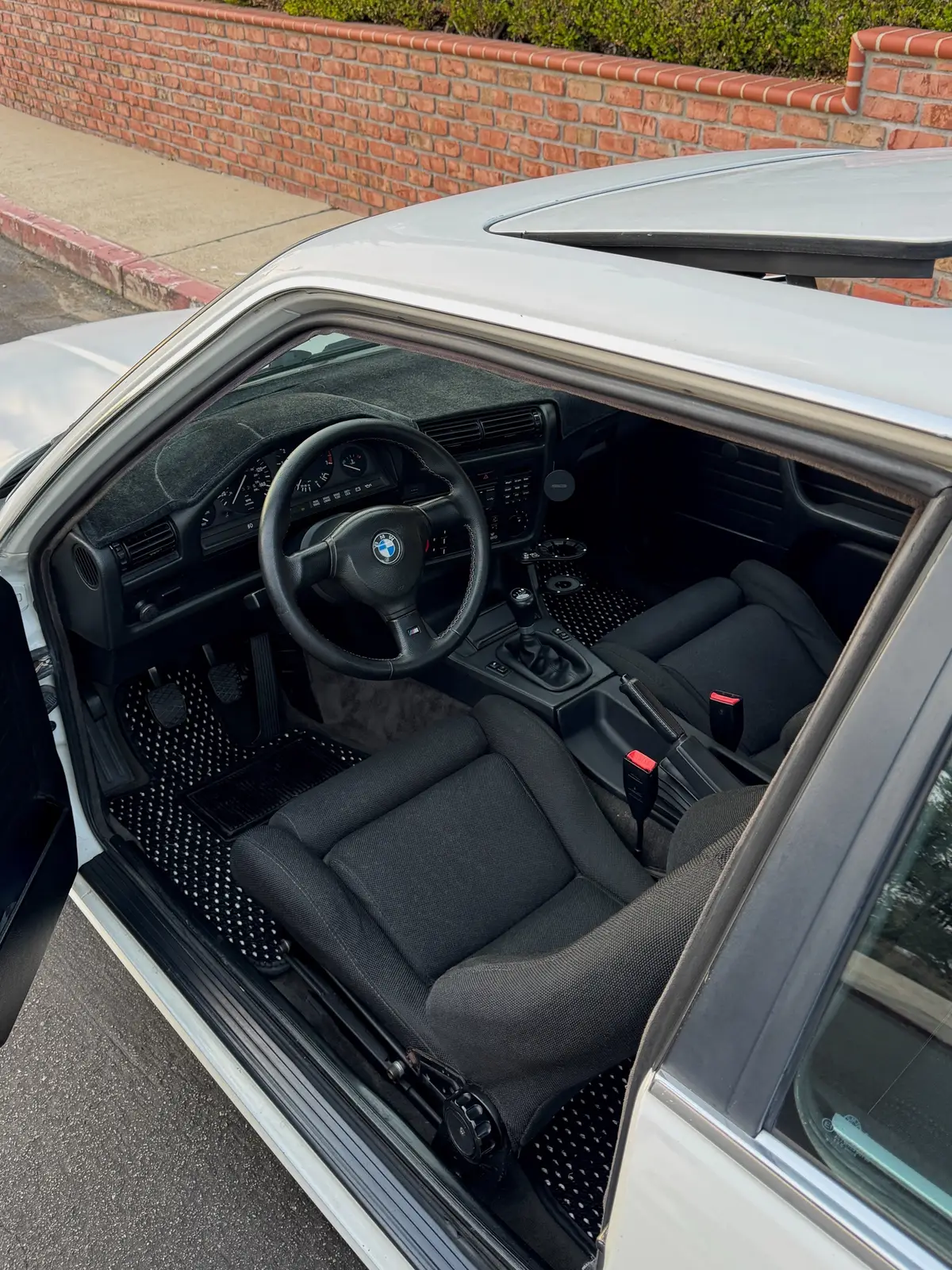 I always knew a set of cocomats were mandatory for this interior #e30 #vintagebmw #fyp 