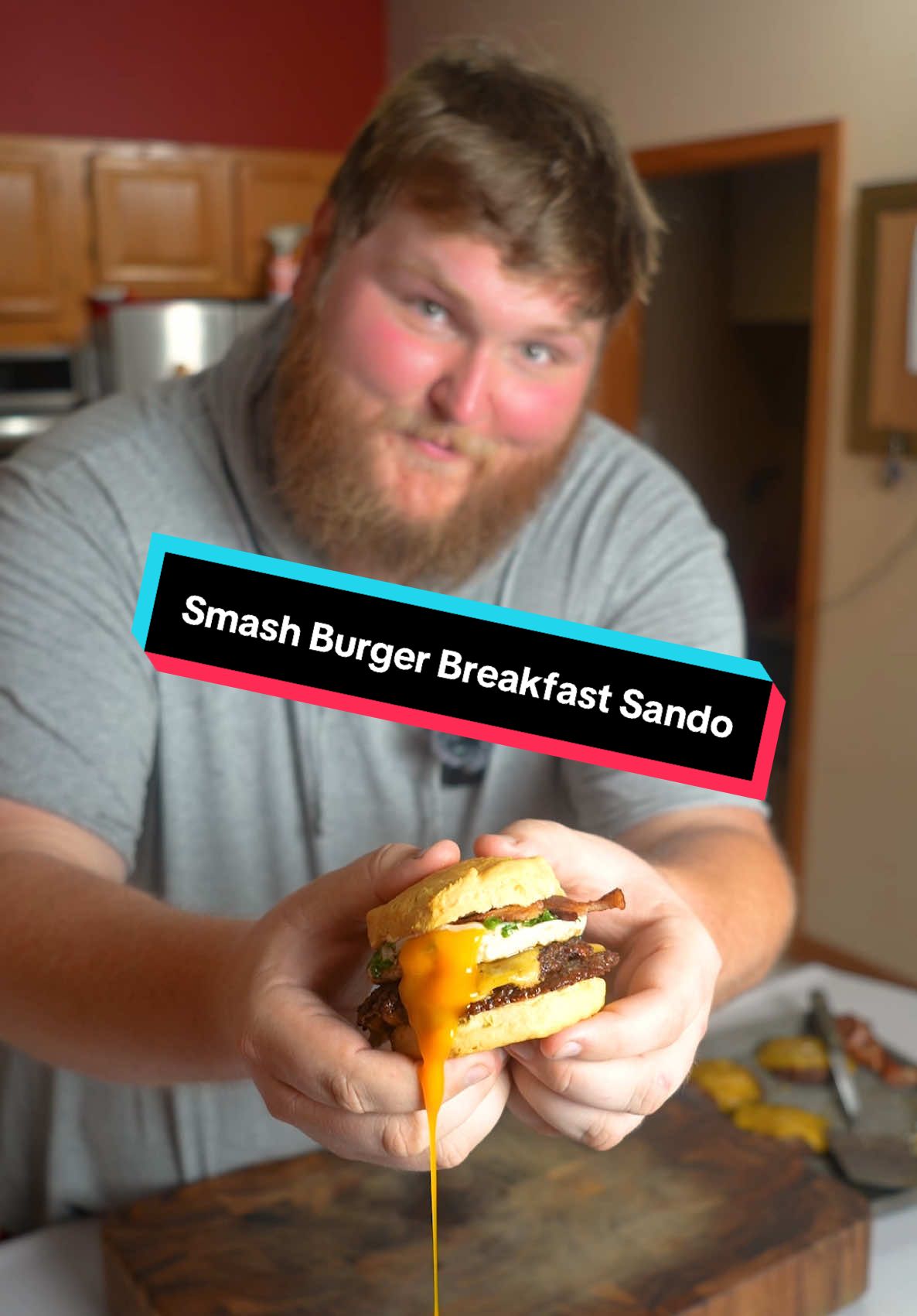 Come make a vibey lil smash burger breakfast sandwich w me 🥰 Ingredients: Homemade Mayo:  1 whole egg  1 1/2 cups canola oil  1 clove garlic  Juice of 1/2 lemon  Salt and pepper  1/4 cup hot sauce of choice  Assembly:  Biscuits  1 pound breakfast sausage  10 slices of bacon  5 slices cheddar cheese  5 eggs  Salt and pepper  Chives  #breakfast #sandwich #breakfastsandwich #bacon #Recipe 