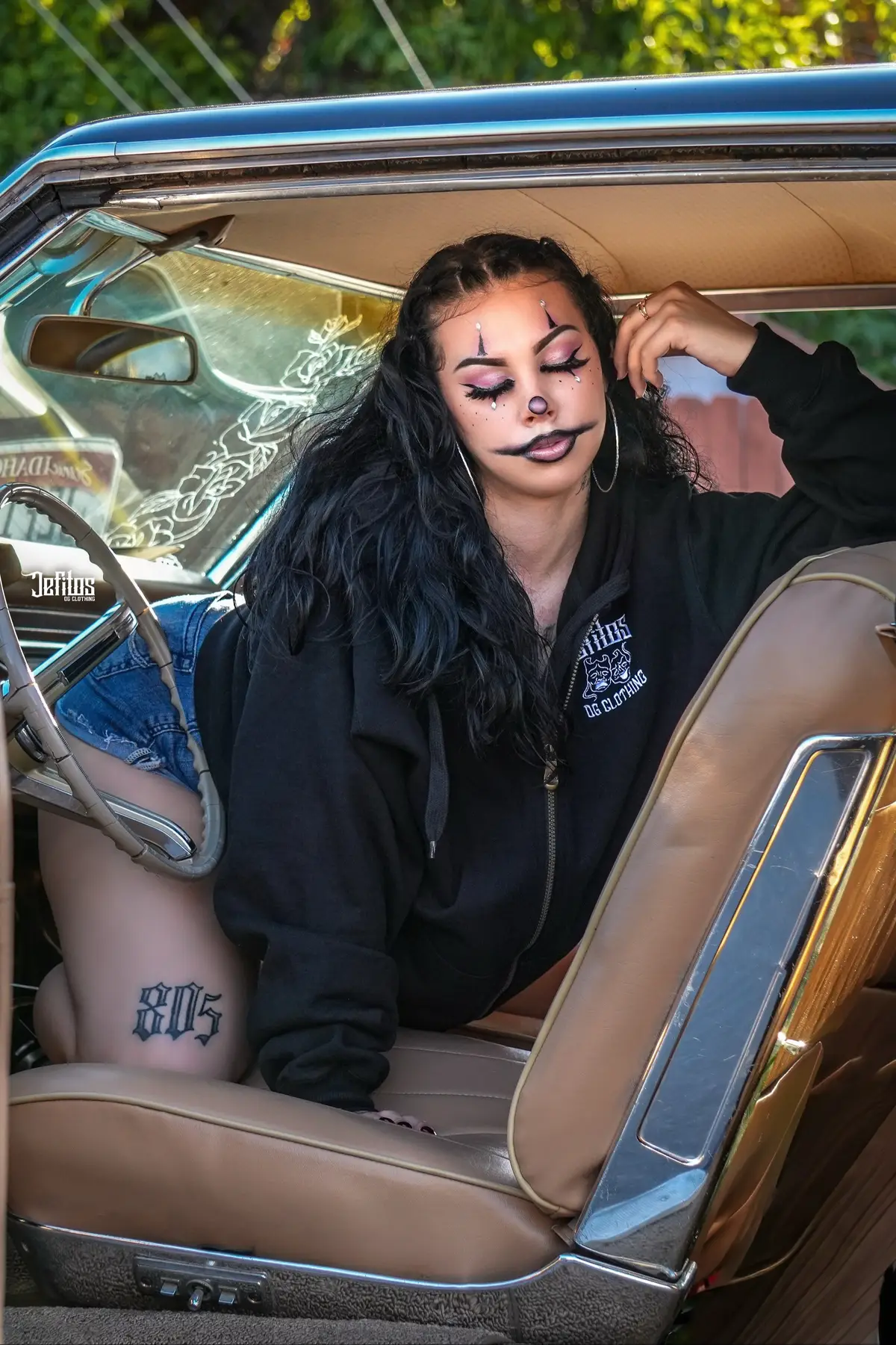 Fall weather calls for layers 🍂🖤 Jefitos OG Clothing Smile Now, Cry Later zip ups are here to keep you warm & street ready all season long. Don’t just stay cozy—stay OG.” Model: @amaaralyn  #jefitos #jefitosogclothingbrand #smilenowcrylater🎭 #lowriderlifestyle #chicanolifestyle 