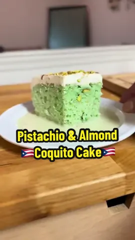Pistachio & Almond Coquito Cake #coquito #cake #PuertoRican #puertorico #holidays  Directions:  1 can of coconut milk 1 can of cream of coconut  1 can of sweetened condensed milk  1 can of evaporated milk  5 scoops of pistachio almond ice cream  1 pinch of ground cloves  Cinnamon to your liking  1 pinch of nutmeg 1 cup of rum of your choice (I use Palo viejo 🇵🇷) Cake directions:  Follow the damn box  But I put chopped pistachios  Added Three drops of food coloring  Half milk  half water  (equals one cup together) 3 eggs  1/2 cup of oil  And I used almond flavored box cake mix Whip cream directions:  One pint of heavy cream  Confectioners Sugar to your taste/liking  1/4 cup of pistachio almond Coquito more or less  Whip until fluffy. BE CAREFUL OVER WHISKING WILL MAKE BUTTER AND BUTTER MILK.  Garnish :  Ground Cinnamon and pistachios 