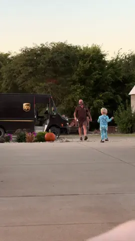 When you catch the cutest moment between your son and @UPS driver