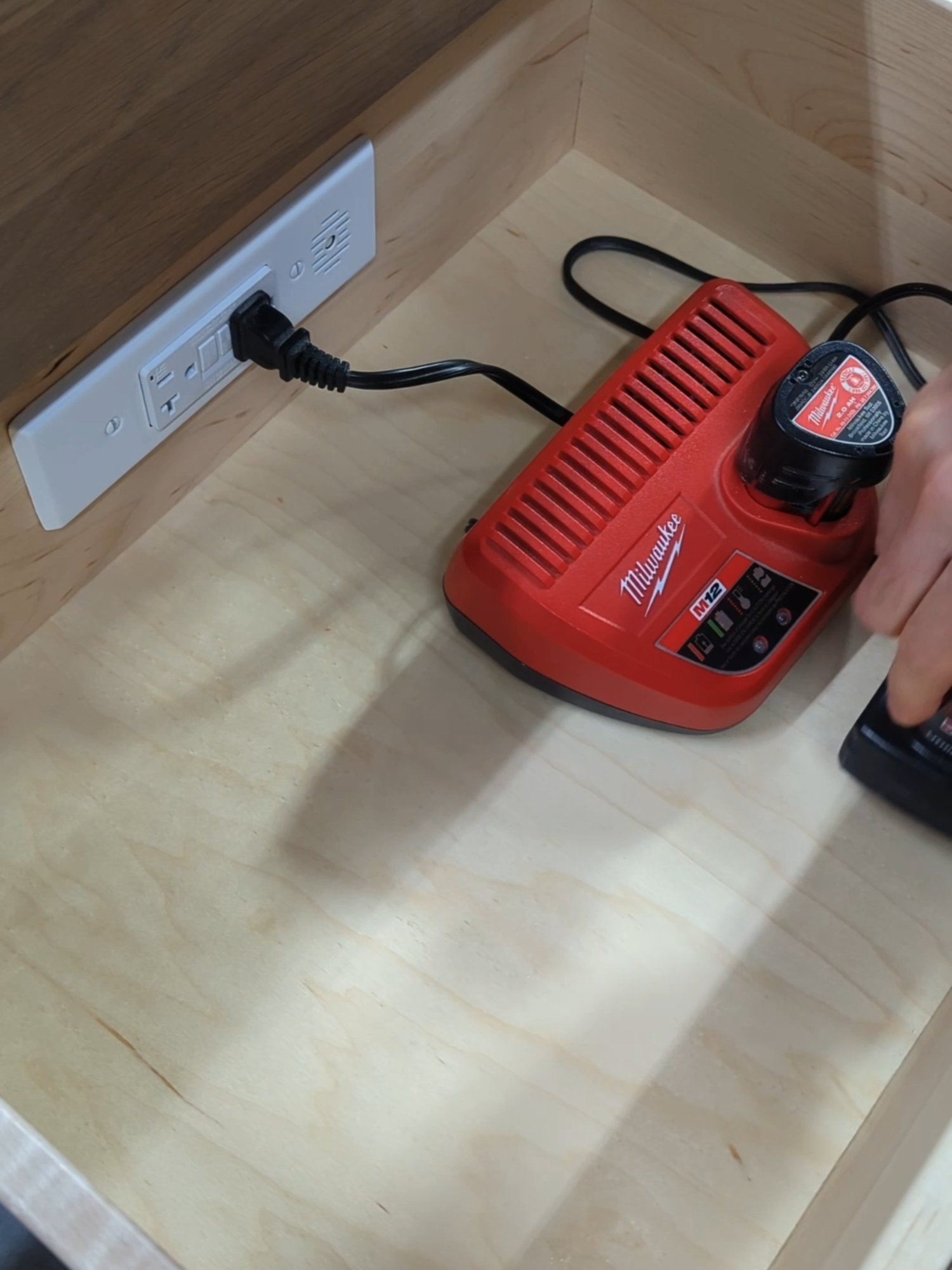 💡 Docking Drawer + GFCI = safe power even in moisture-prone spaces. Joseph from Hartville Cabinet and Design designed this drawer to keep styling tools organized and off the countertop for a cleaner, more functional space, and installed the 20 Amp Blade with GFCI to safely power grooming tools in a moisture-prone environment. #electrical #install #hacks #remodel #construction