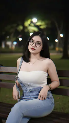 Ai secandu itu emang 🫵🏻😩🔥🔥 The method: 1. Open goggle/chrome  2. ⁠Copy text Prompt : A beautiful young Indonesian woman sitting on a park bench at night. She has shoulder-length black hair, neatly styled, and she is wearing large, fashionable eyeglasses. Her body is slim with big voluptuous breast. Her outfit consists of a tight white tube top paired with light blue denim overalls, with one strap hanging down casually. She has a delicate gold necklace and a stylish wristwatch on her left arm. The woman is leaning slightly to bench with a confident and relaxed pose. Her expression is soft and composed, with a slight smile. The lighting is soft and flattering, highlighting her smooth skin and elegant features. 9:16 #AI  #Gemini  #CapCut #fyppppppppppppppppppppppp #trending 