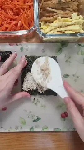 Making mini kimbap