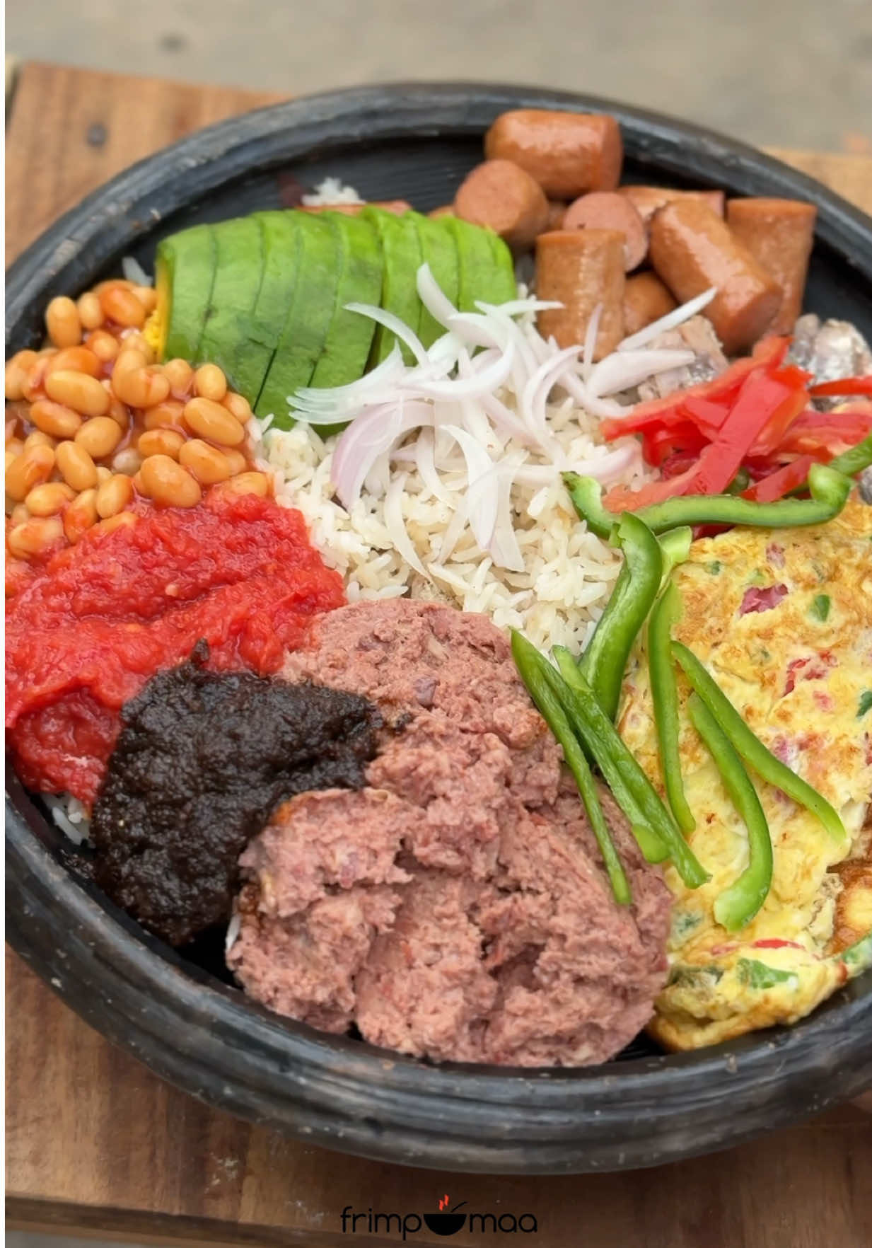 Ghanaian braised rice . Angwamo directly translates from twi as Oil Rice . The oil used to cook this rice is more unlike regular cooked plain rice . The toolo beef gives it a distinct flavor . #ghanatiktok🇬🇭 #ghanaianfood #nigeriantiktok🇳🇬 #fyp #viral 
