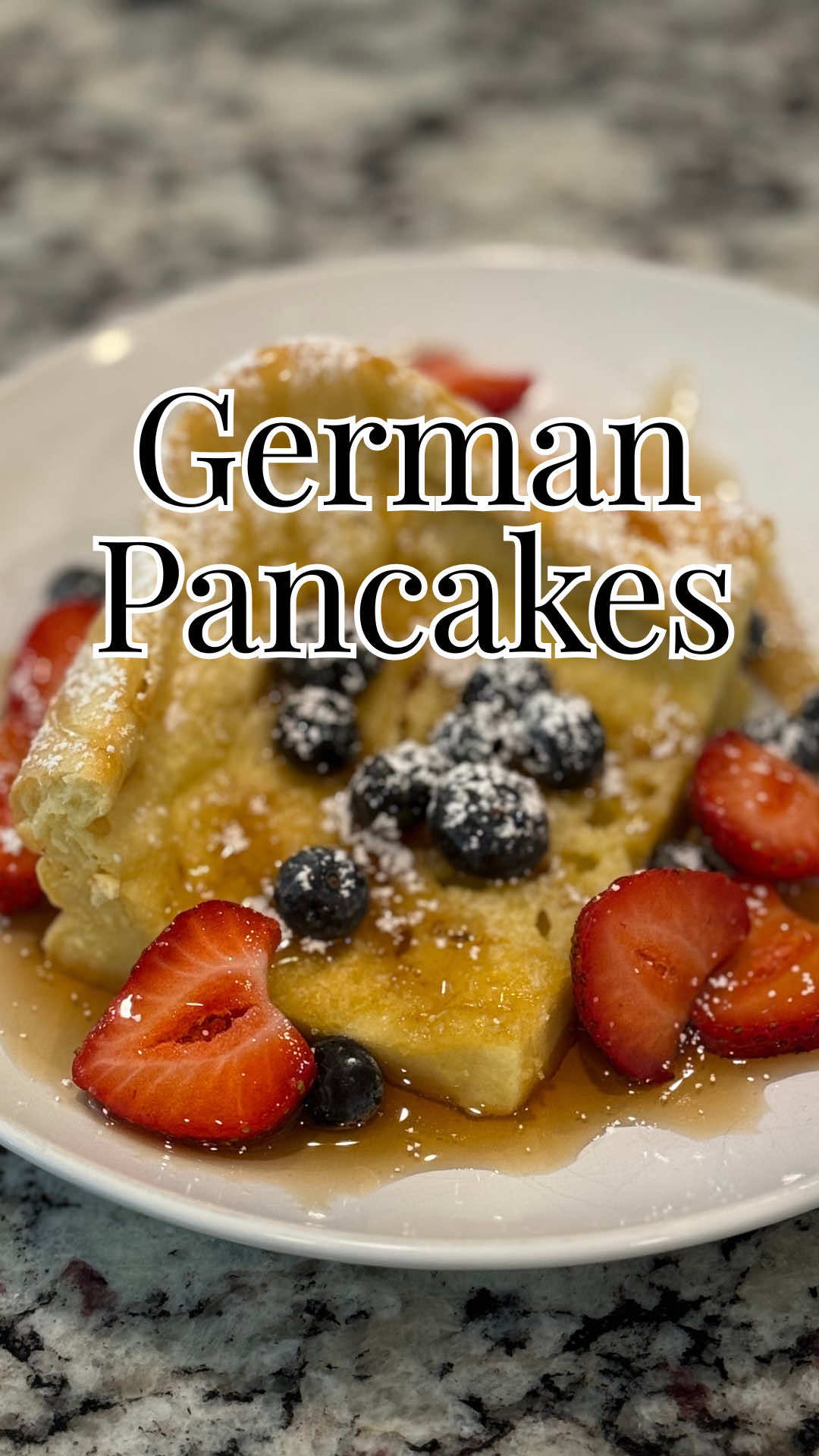 I love starting the day with these German pancakes — they’re quick, cozy, and perfect after a morning workout! Just blend the batter, pop it in the oven, and by the time you’re ready for the day, a fluffy, golden pancake is waiting. Dust with powdered sugar and add your favorite fruit (I love frozen blueberries) plus a drizzle of syrup for a simple, delicious breakfast. Ingredients 	•	½ stick butter (4 Tbsp), cut into pieces 	•	6 large eggs 	•	1 cup all-purpose flour 	•	1 cup milk 	•	½ tsp salt 	•	½ tsp vanilla extract 	•	1 tsp almond extract Instructions 1️⃣ Preheat oven to 350°F (175°C). 2️⃣ Place butter pieces in an ovenproof pan; set in the oven to melt as it preheats (don’t let it brown). 3️⃣ In a blender, combine eggs, flour, milk, salt, vanilla, and almond extract. Blend until smooth (or whisk by hand until lump-free). 4️⃣ Swirl melted butter to coat the bottom and sides of the hot pan. Immediately pour in batter. 5️⃣ Bake 30 minutes, or until puffed and golden at the edges. 6️⃣ Dust with powdered sugar and serve with fresh or frozen berries and a little syrup. #GermanPancakes #DutchBaby #BreakfastGoals #DeliciouslyBold #EasyBreakfast
