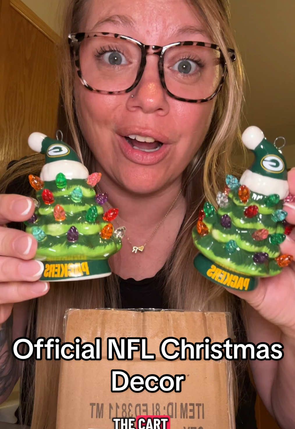 Replying to @eileenbean19 Unboxing the cutest holiday decor for football fans 🎄🏈 These NFL LED Christmas trees are officially team branded, light up with LEDs, and come as a two pack so you can gift one and keep one. Perfect for Christmas decorating or gifting — check stock before your team sells out #packersnation #footballfan #christmasdecor #giftsforhim #TikTokShopCreatorPicks