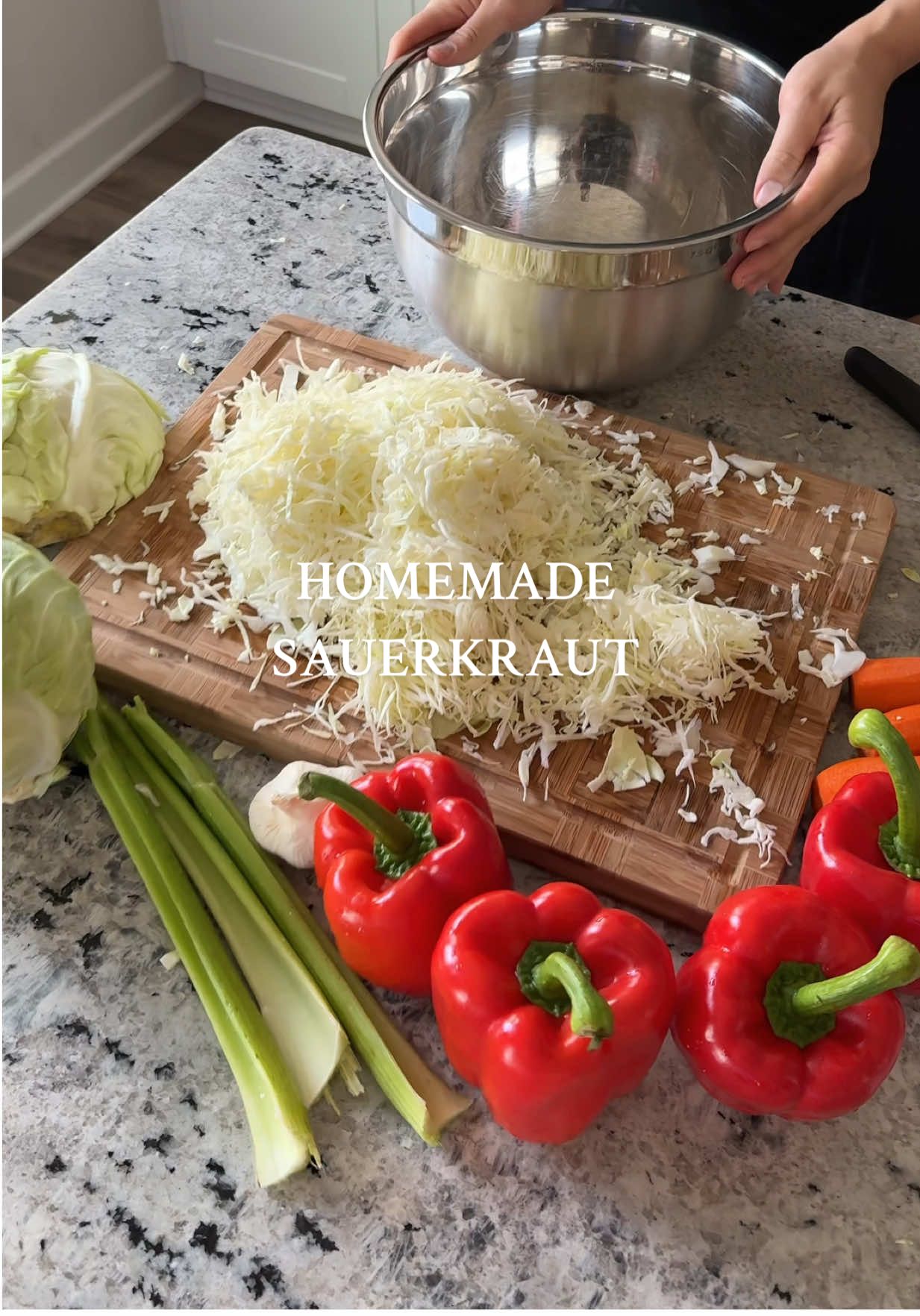 So easy to make & soo good🙌🏼 Sauerkraut Recipe:  2medium cabbages 1 head cauliflower (I didn’t add it this time but it’s good with it)  4 red bell peppers  3 sticks celery  1 head garlic (just peel and place on top)  3 carrrots  Boil:  6 cups water  3/4 oil avocado or olive oil  4 tbsp salt 1 cup sugar  2 cups vinegar  10 whole black peppers Once it boils layer the veggies in a large bowl: 1st bell peppers, carrots, celery, cauliflower, cabbage, & lastly garlic.  -Pour boiling liquid on top. Youll notice the cabbage will start to shrink.  -Cover bowl with parchment paper and place something heavy on top to add some pressure.  -Leave out on your counter in room  temperature for 24 hours  -after 24 hours mix it up and enjoy😊  This can last in your fridge for a couple months but I doubt it’ll stay that long 😉  #sauerkraut #Recipe#EasyRecipe#guthealthy#homemade  @OXO 