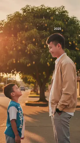 Create a realistic scene showing two versions of me - a child and an adult - standing side by side in a nostalgic neighborhood setting. Include a large mango tree in the background, golden hour lighting, and a side view perspective where we're facing each other with a slight upward gaze from the child. Maintain identical facial features and clothing details while blending both photos seamlessly into one cohesive image. #trending #geminiai #ai #fyppppppppppppppppppppppp #makeitviral 