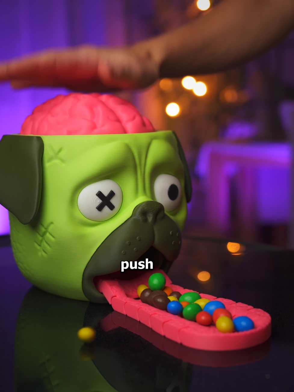 This project almost broke me. 😵‍💫   It started as a fun Halloween idea: a zombie pug that spits candy when you push his brain.    But then came the M&Ms. 😅 For 2 weeks straight I couldn't think of anything else.   But the struggle was worth it. It’s my favorite build so far. Once you press the brain and get your candy, you’ll keep doing it. Not even for the candy. Just for the brain push.   Sometimes the silliest ideas take the most effort. Worth it. 🧠🐶🍬 🎃 Available now - 🔗 in bi0 Let me know in the comments which animal I should make next 👀 #3DPrinting