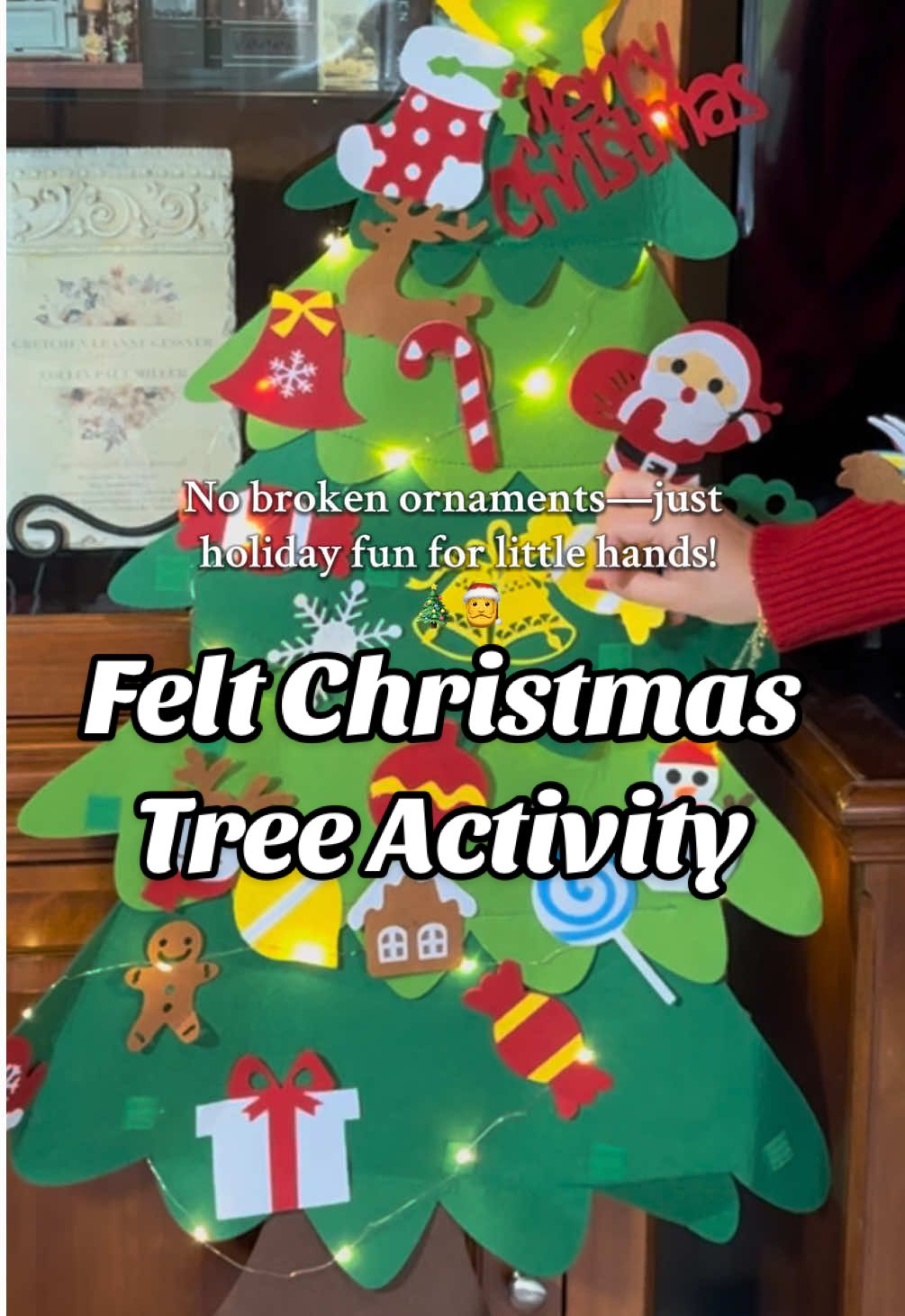 🎄The cutest holiday activity for kids! This DIY felt Christmas tree comes with detachable ornaments + LED lights—perfect activity all season long. #diychristmas #kidschristmas #christmastraditions #christmasdecor #christmascrafts 